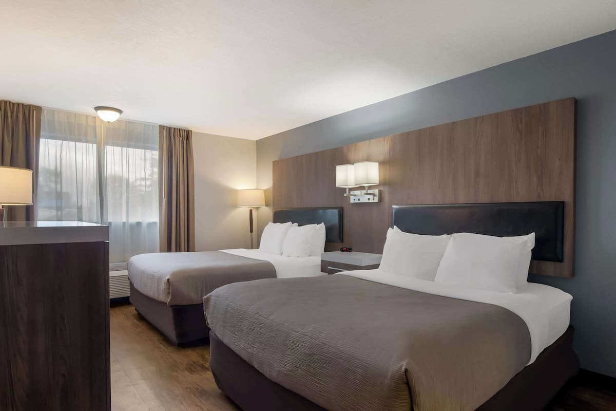 Premium bedding, desk, blackout drapes, iron/ironing board