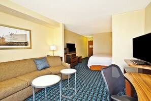 Premium bedding, desk, laptop workspace, blackout curtains