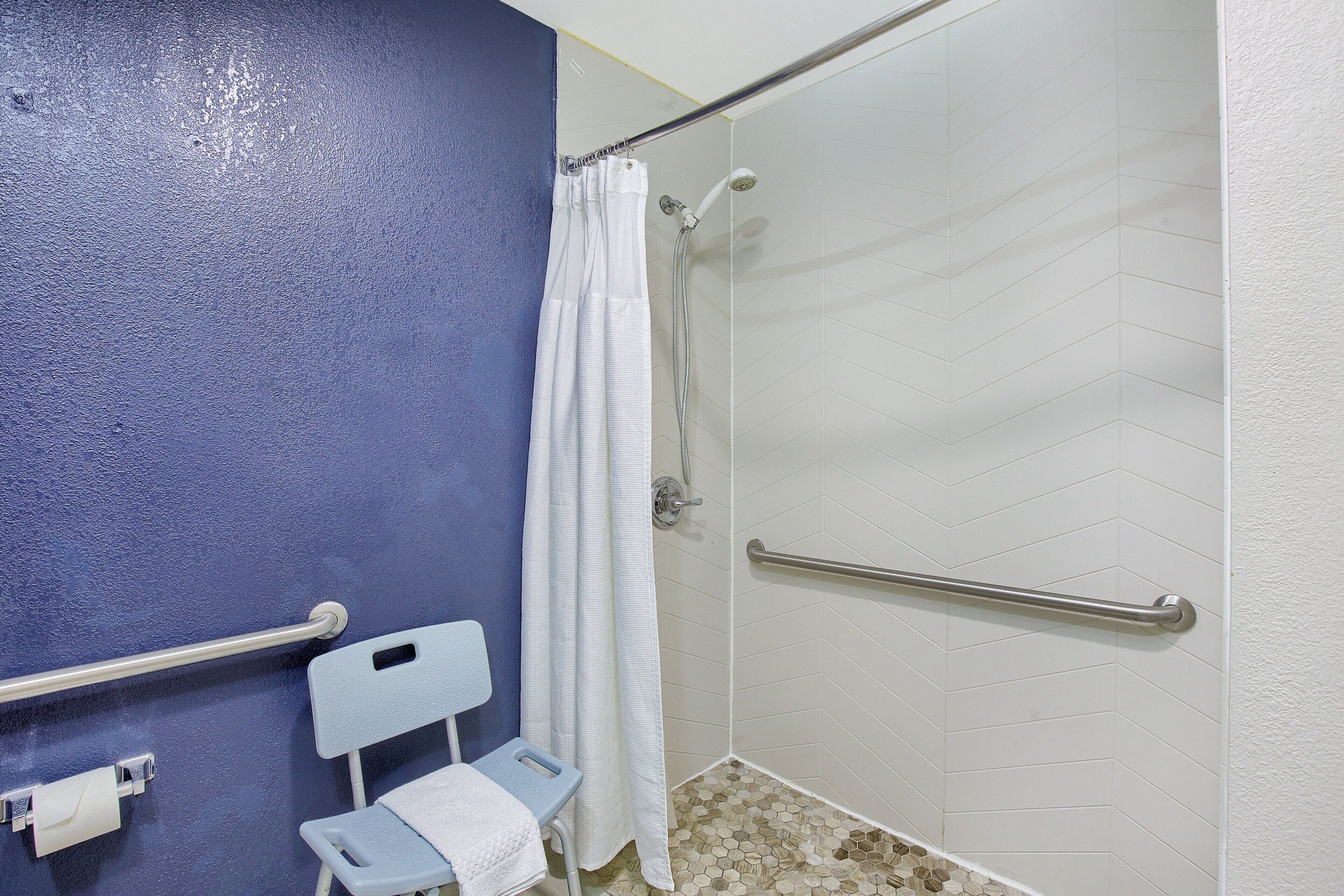 room, 2 queen beds | bathroom | free toiletries, hair dryer, towels