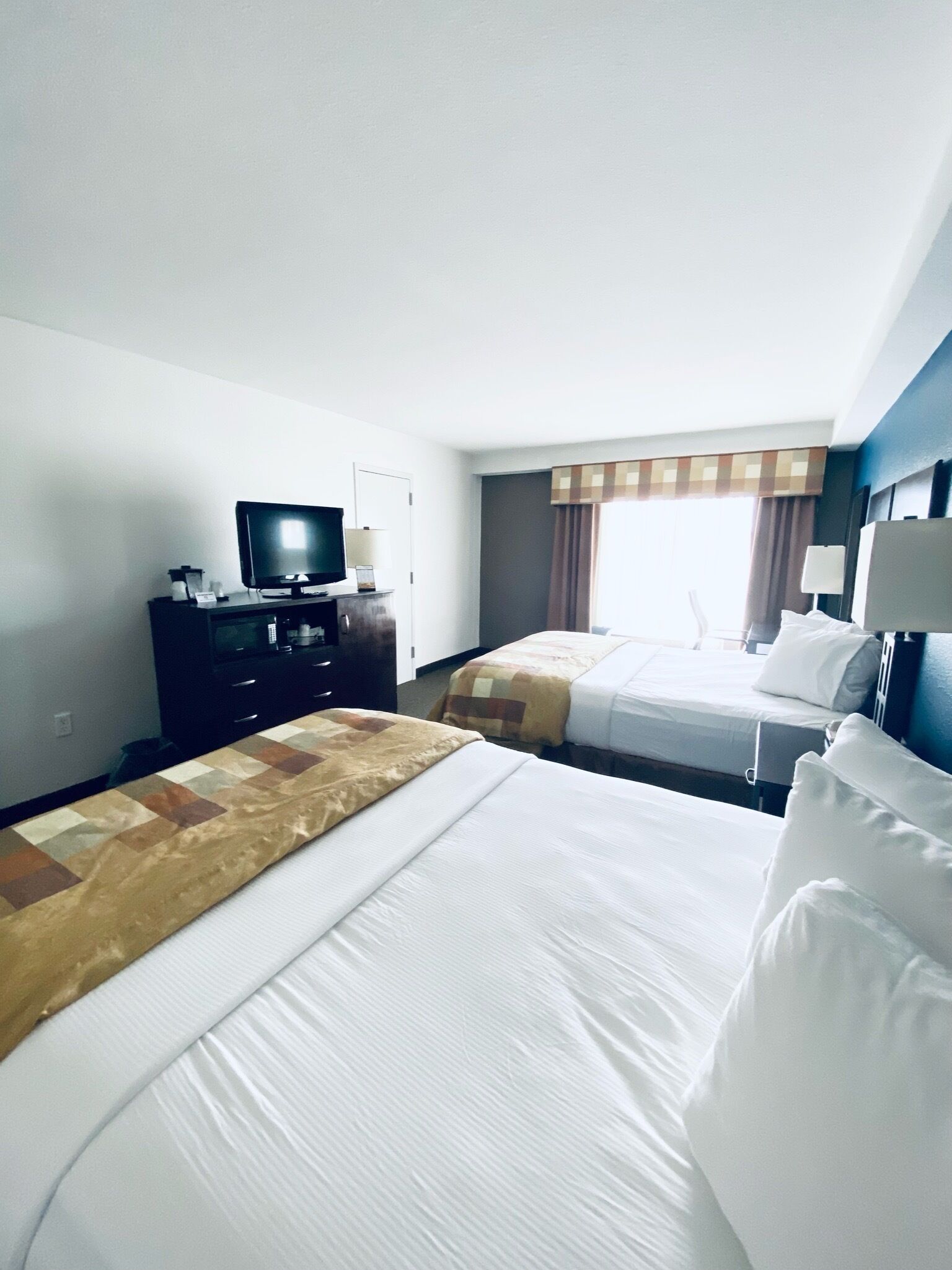 standard room, 2 queen beds, non smoking | premium bedding, desk, blackout curtains, iron/ironing board