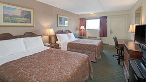 A hotel room with two beds, a desk, a chair, a television, and a window with curtains. - Super 8 by Wyndham Shelby (Shelby)