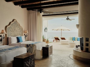 A hotel room with two beds, a view of the sea, and a balcony with seating. - Las Ventanas al Paraiso, A Rosewood Resort (San José del Cabo)