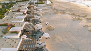 A resort with multiple swimming pools, sun loungers, and a beach area. - Las Ventanas al Paraiso, A Rosewood Resort (San José del Cabo)