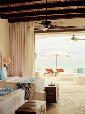 Ocean Front  Double with Two Queen Size Bed Junior Suite | Living area | 50-inch Smart TV with satellite channels, fireplace, DVD player