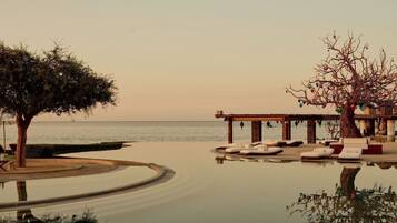 8 outdoor pools, cabanas (surcharge), pool umbrellas