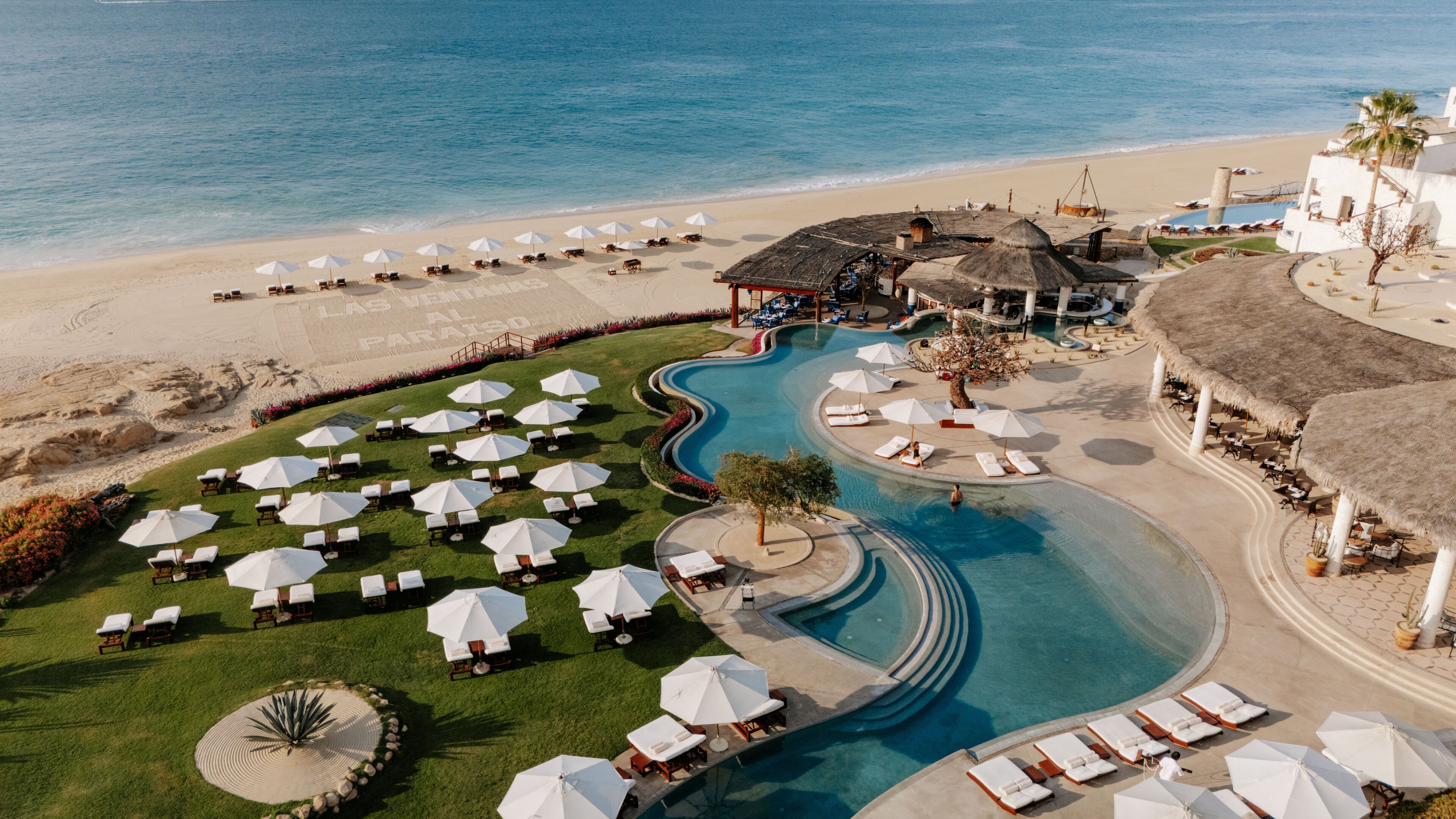 On the beach, beach cabanas, sun-loungers, beach umbrellas