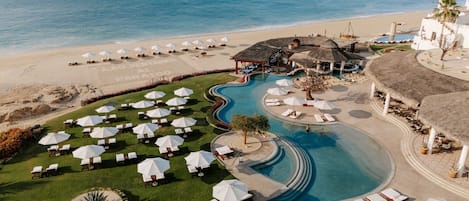 On the beach, beach cabanas, sun loungers, beach umbrellas