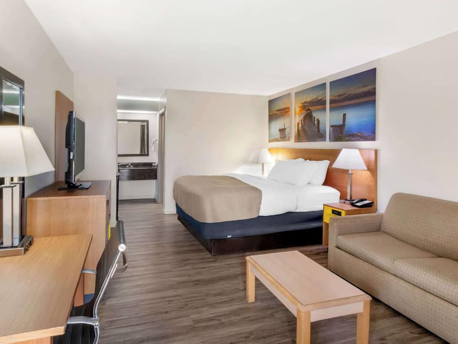 Suite, 1 King Bed, Non Smoking (Efficiency) | Laptop workspace, blackout drapes, iron/ironing board, free WiFi