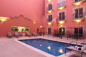 Outdoor pool, open 8 AM to 8 PM, sun loungers