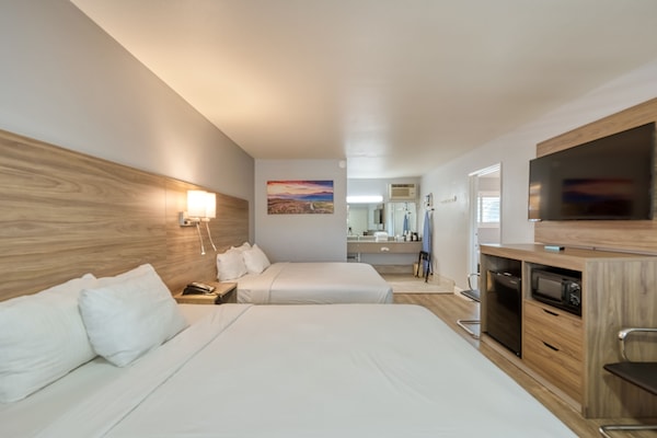 Family Studio Suite | Desk, blackout curtains, iron/ironing board, cots/infant beds