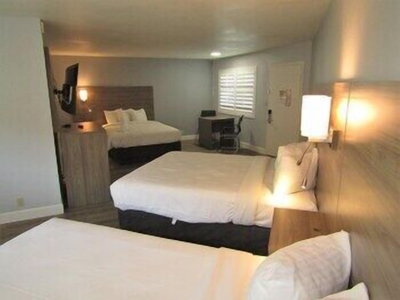 Desk, blackout curtains, iron/ironing board, cots/infant beds