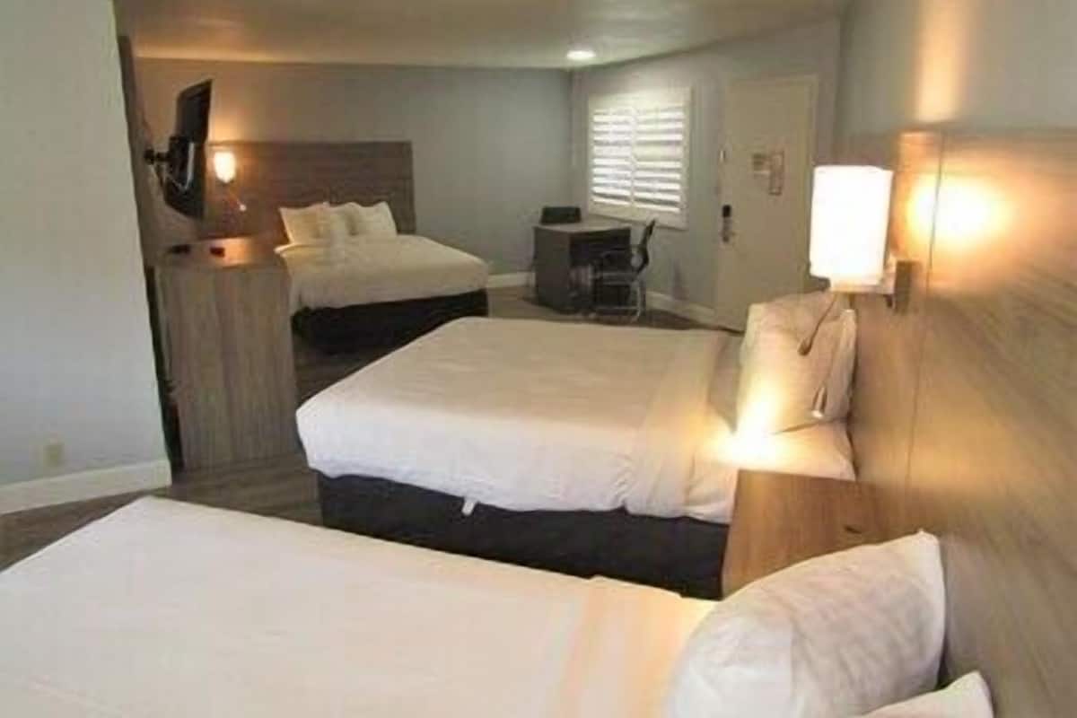 Desk, blackout drapes, iron/ironing board, cribs/infant beds