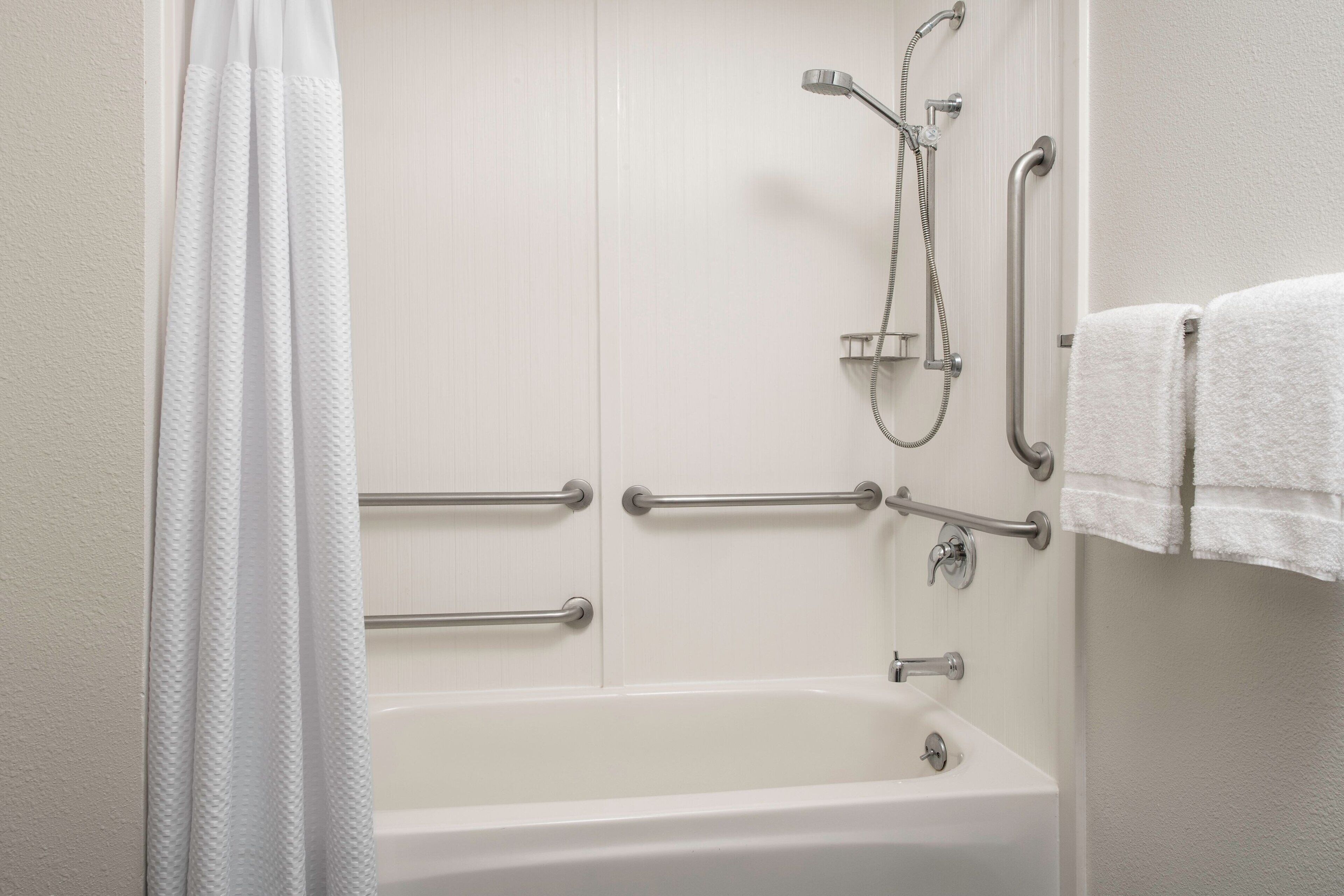 combined shower/bathtub, free toiletries, hair dryer, towels