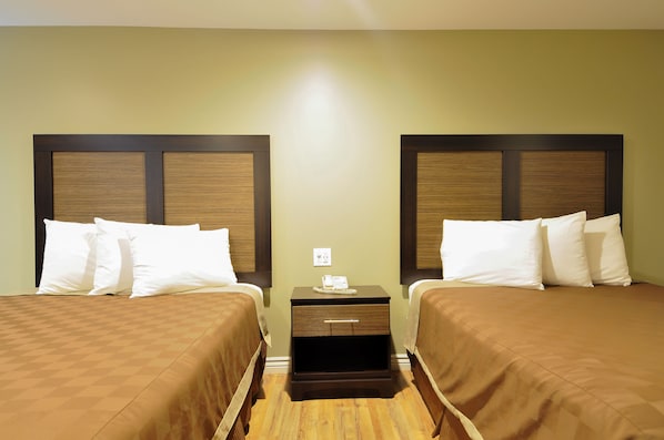 Quadruple Room, 2 Queen Beds, Accessible | In-room safe, desk, laptop workspace, blackout curtains