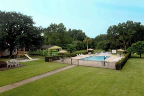 Outdoor pool, open 8:00 AM to 9:00 PM, pool umbrellas, sun loungers