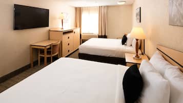 Premium bedding, desk, laptop workspace, iron/ironing board