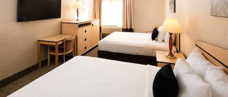 Premium bedding, desk, laptop workspace, iron/ironing board