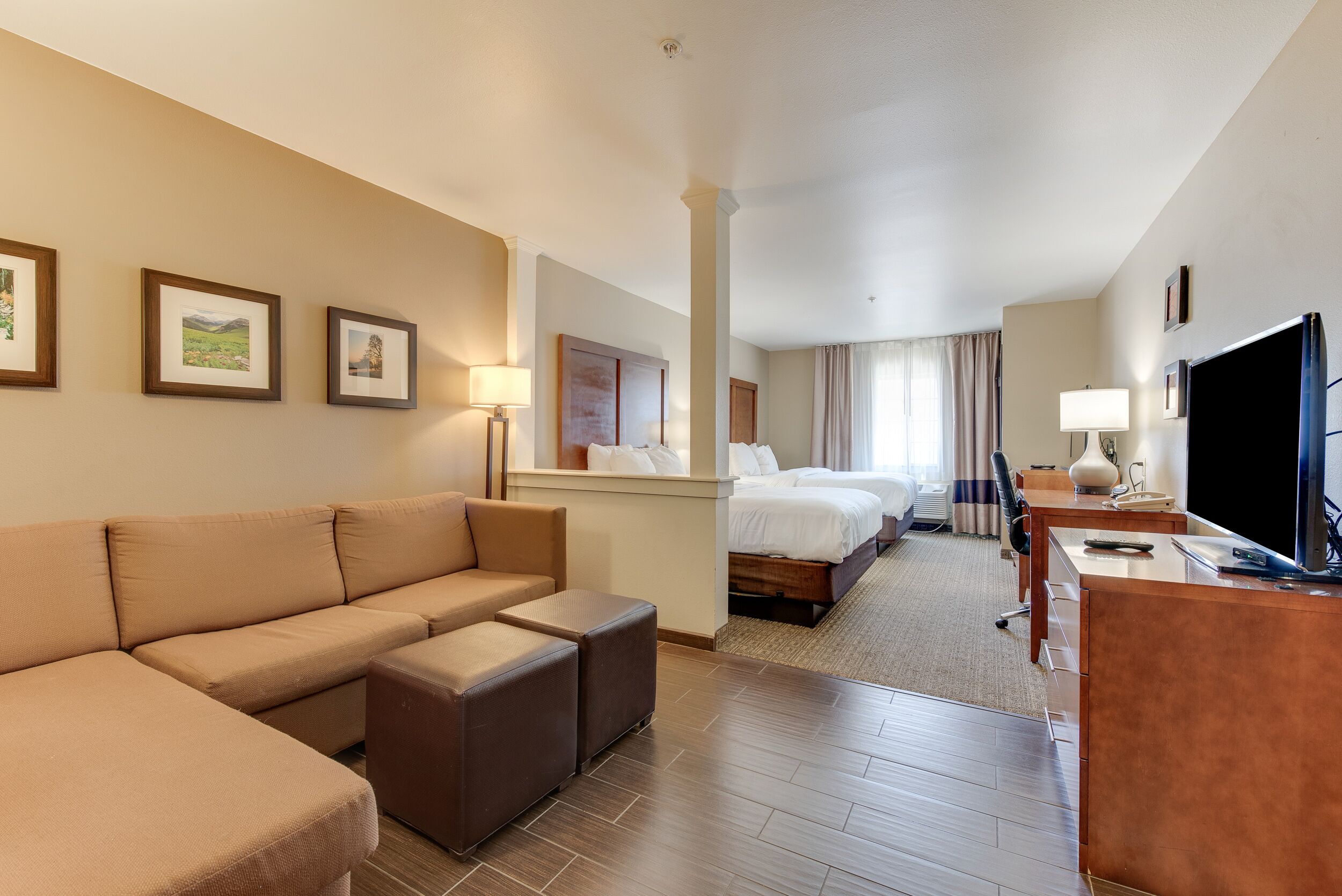 suite, multiple beds, non smoking | living area | 40-inch flat-screen tv with cable channels, tv