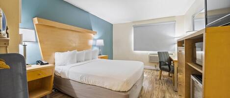 Standard Room, 1 Queen Bed | Desk, iron/ironing board, free WiFi, bed sheets