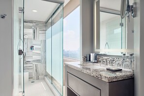 Suite, 1 King Bed, Non Smoking, City View (Corner) | Bathroom | Shower, rainfall showerhead, free toiletries, hair dryer