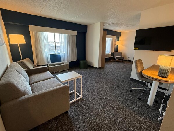 Room, 1 King Bed with Sofa bed | Living area | 39-inch flat-screen TV with cable channels, TV