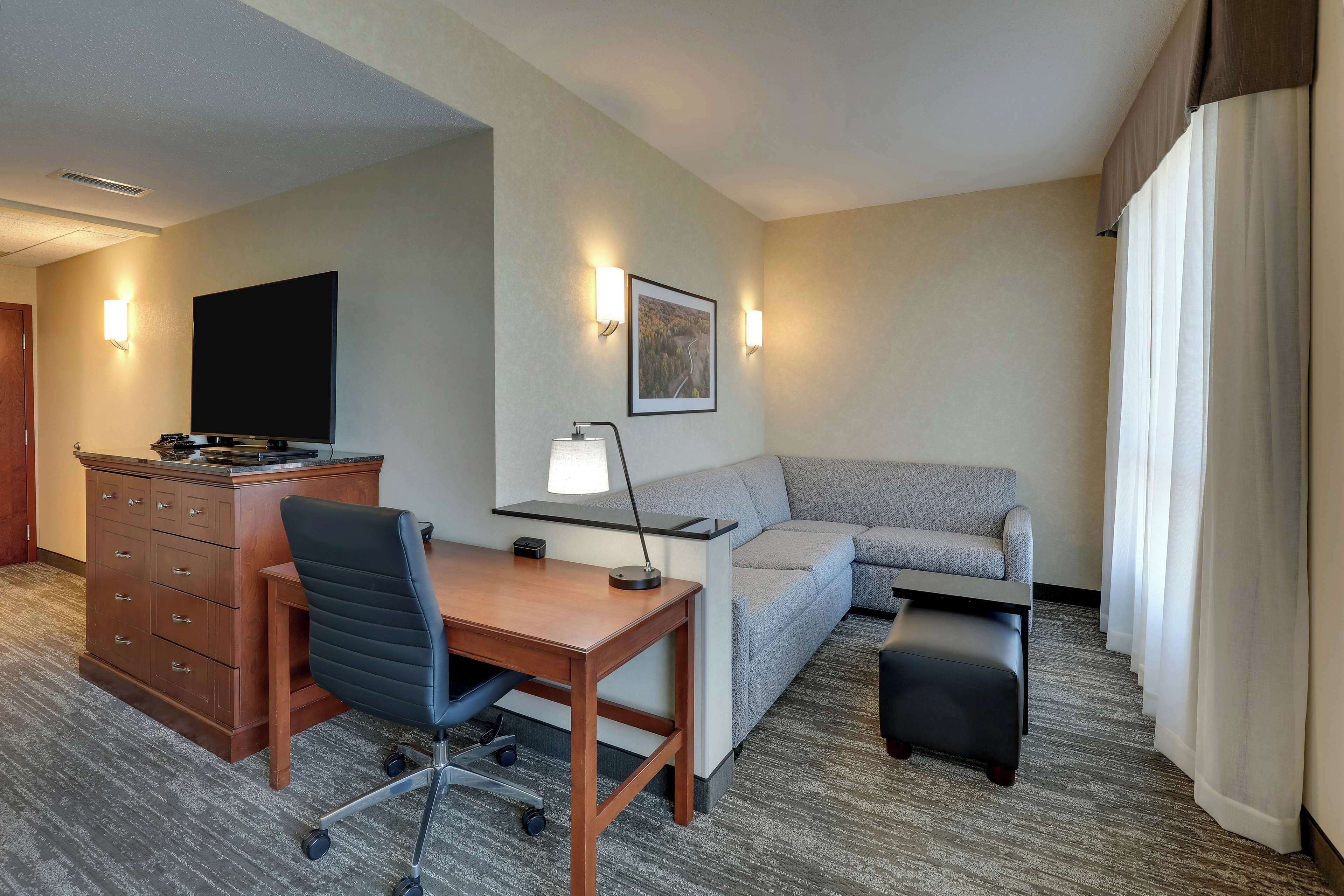 desk, blackout curtains, iron/ironing board, free cots/infant beds