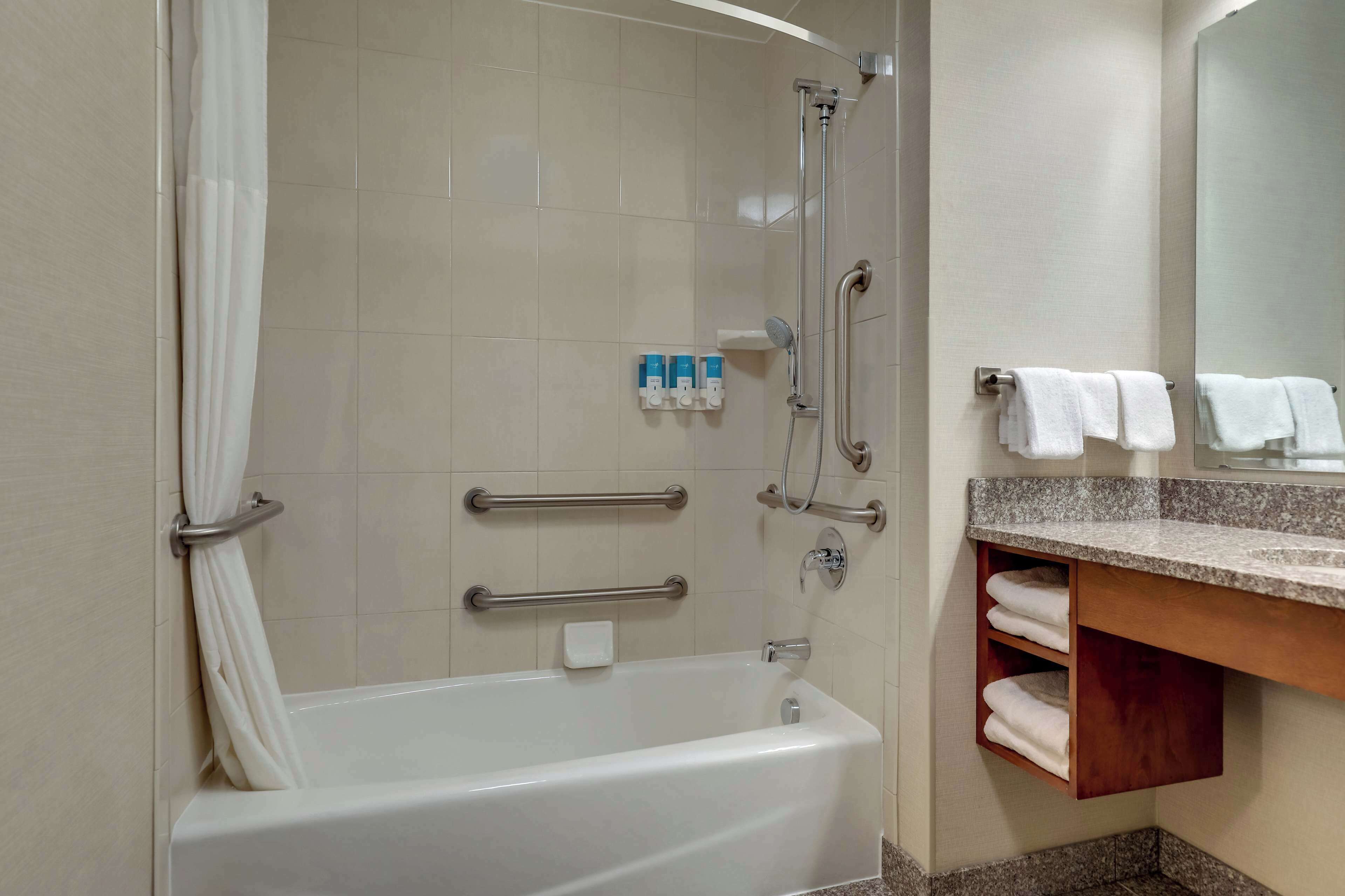 combined shower/bathtub, free toiletries, hair dryer, towels
