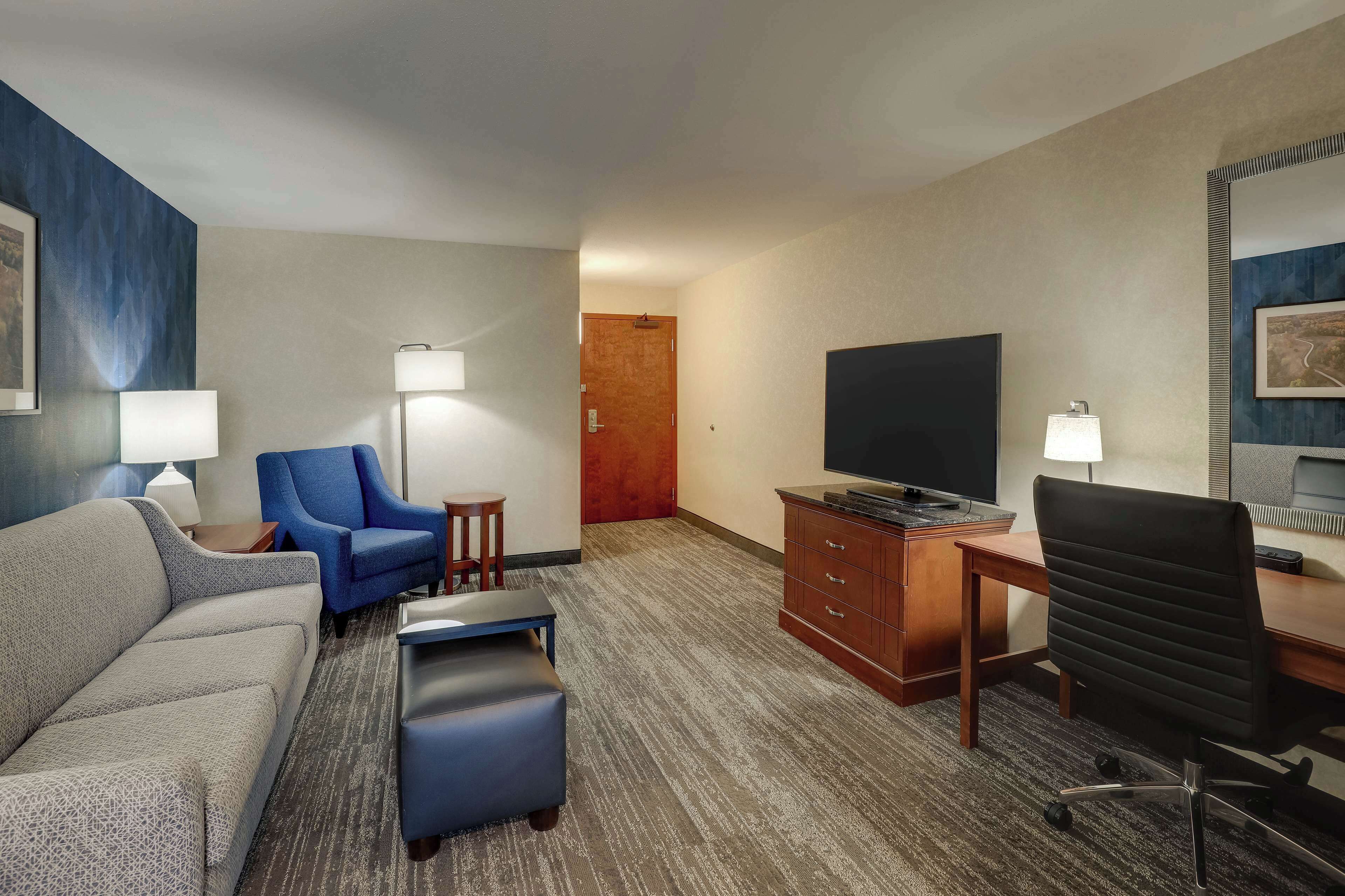 desk, blackout curtains, iron/ironing board, free cots/infant beds