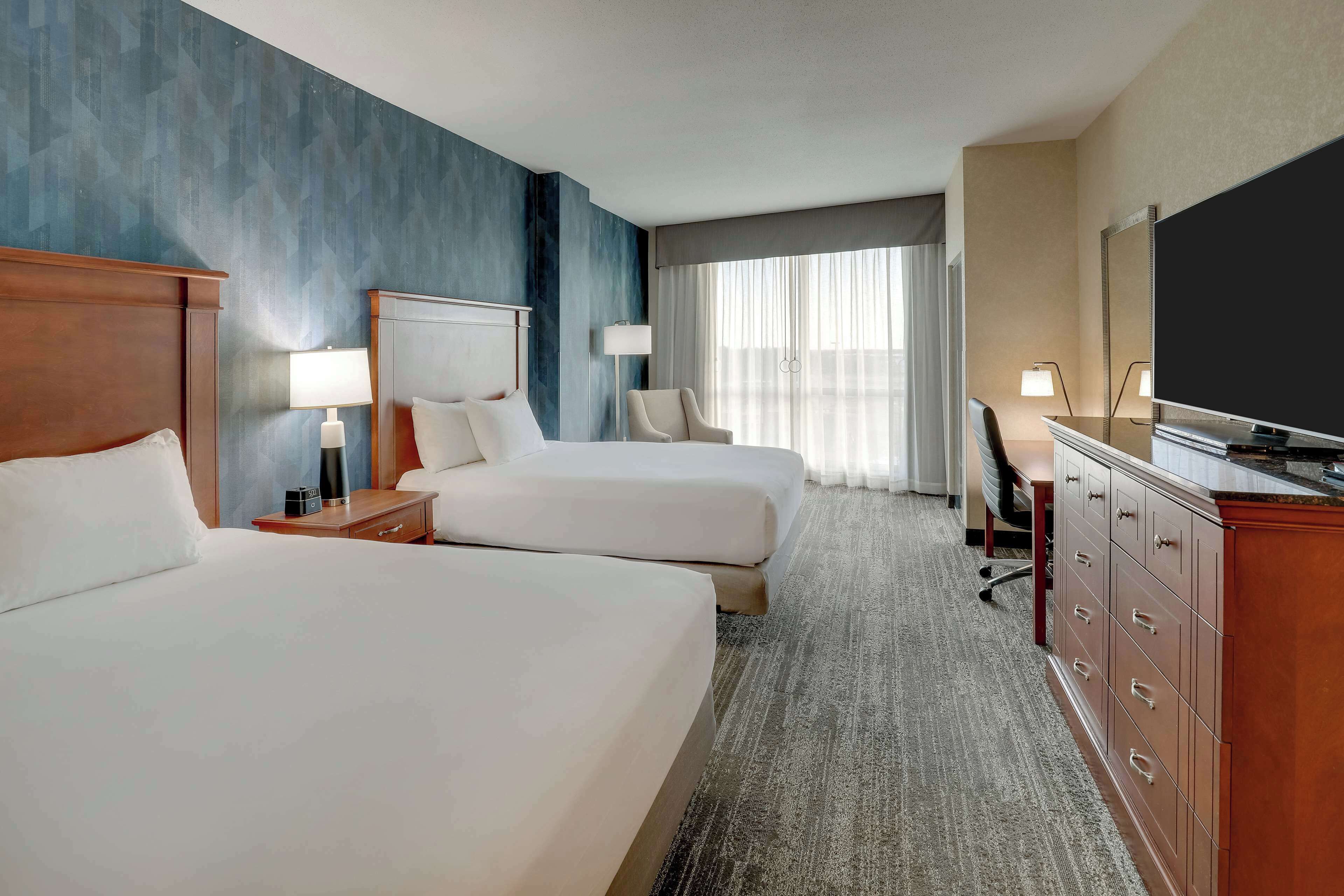 desk, blackout curtains, iron/ironing board, free cots/infant beds