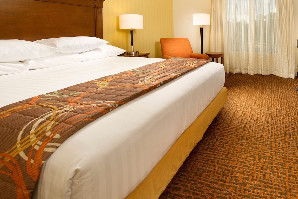 Desk, blackout drapes, iron/ironing board, free cribs/infant beds