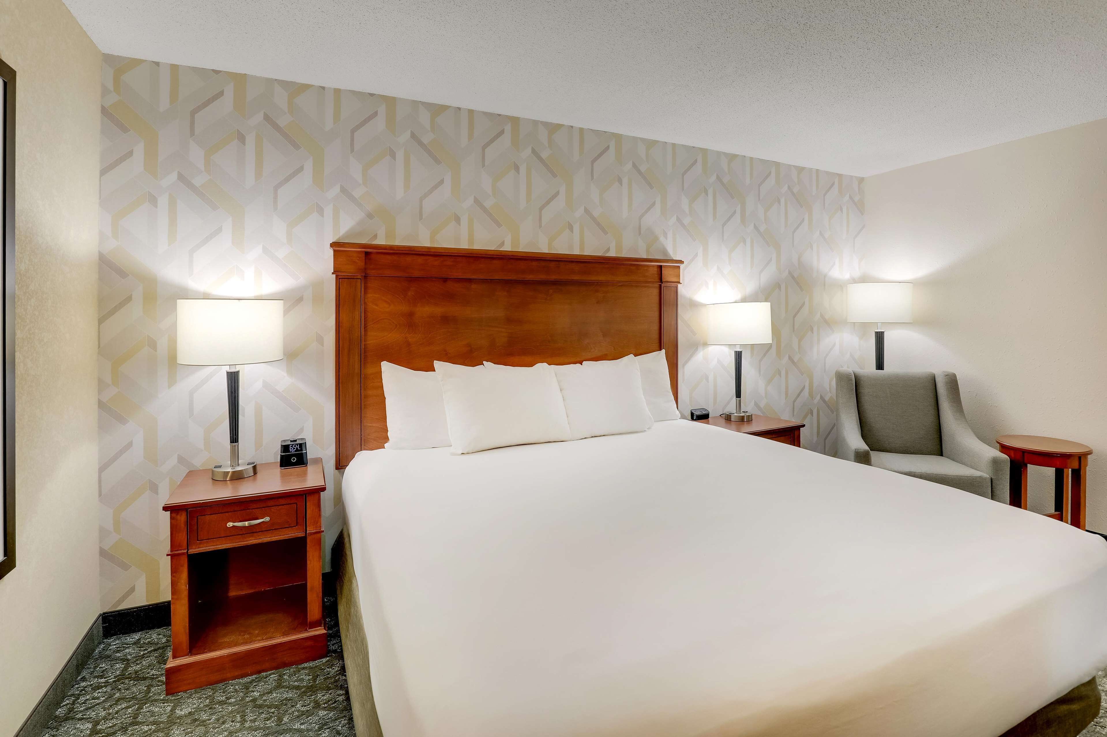 premium bedding, desk, blackout curtains, iron/ironing board