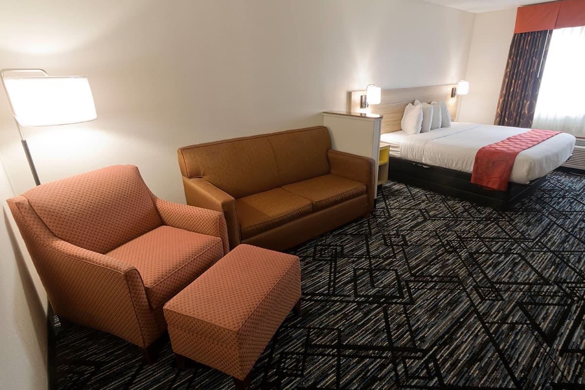 Suite, 1 King Bed, Non Smoking | Desk, laptop workspace, iron/ironing board, free cots/infant beds