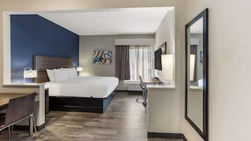 Premium bedding, pillow-top beds, desk, laptop workspace