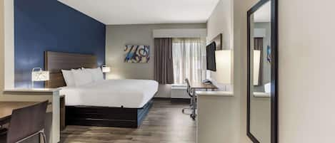 Premium bedding, pillow-top beds, desk, laptop workspace