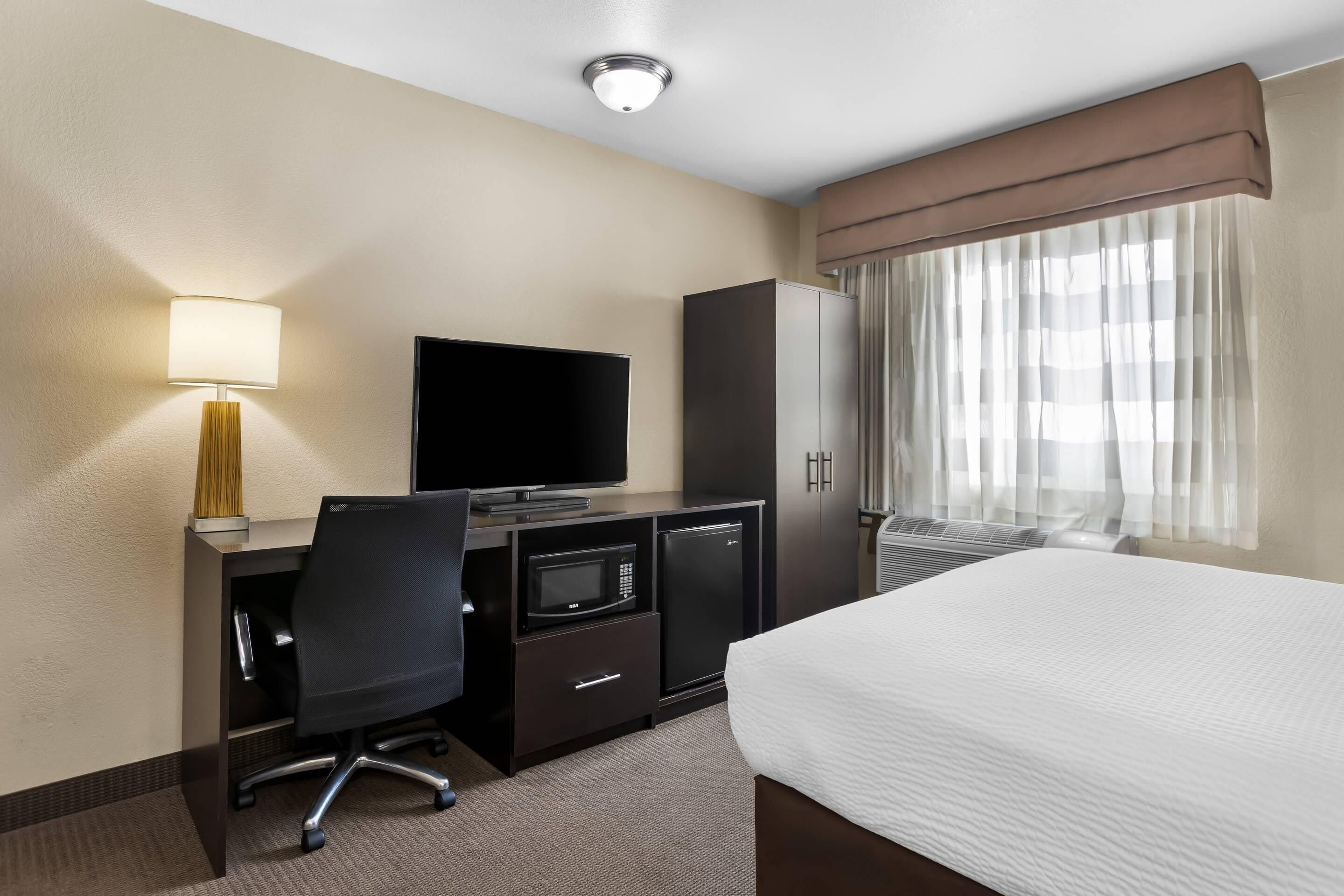 Desk, blackout drapes, iron/ironing board, WiFi (free)