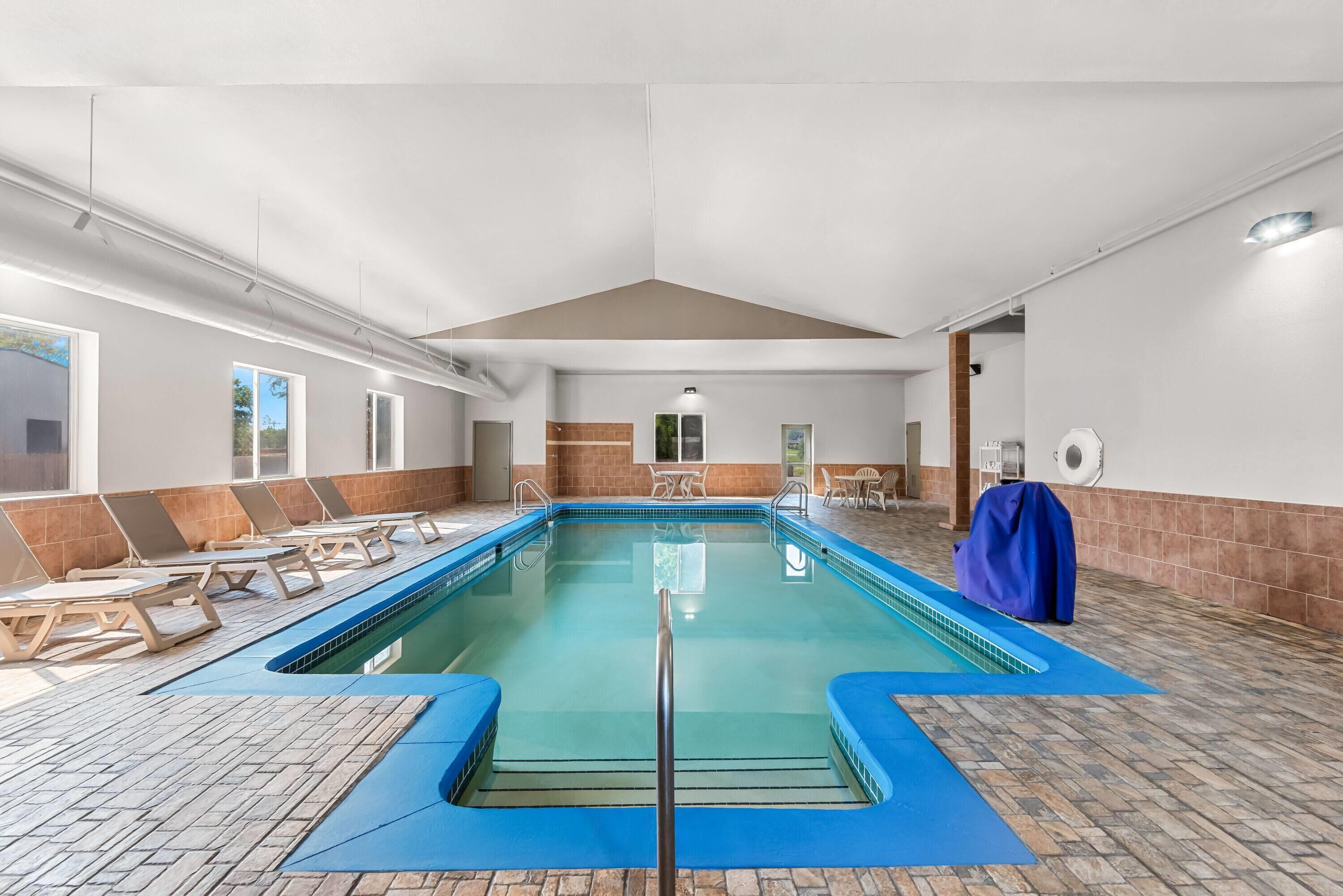 Indoor pool, open 10:00 AM to 10:00 PM, sun loungers