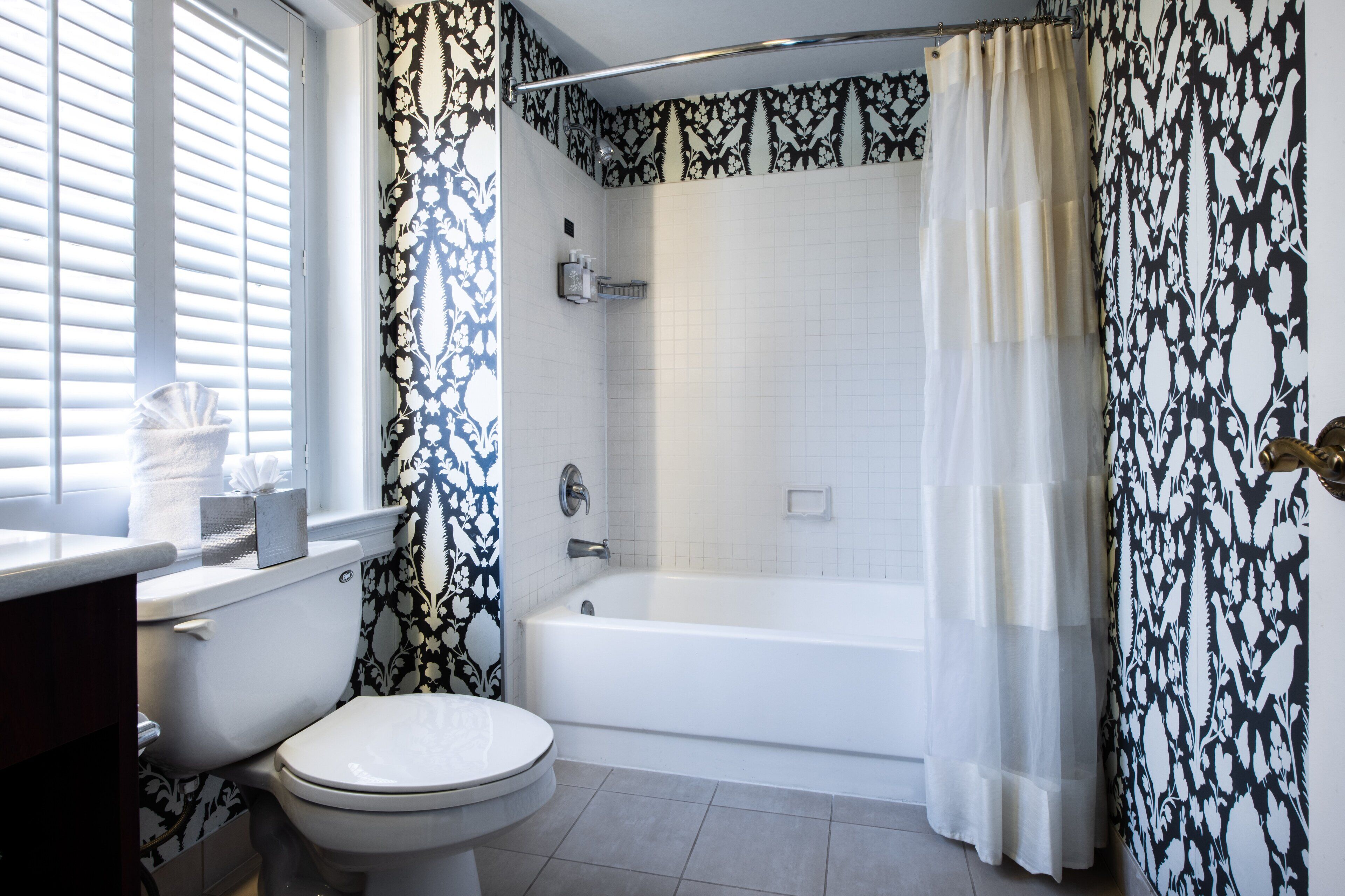 eco-friendly toiletries, hair dryer, towels