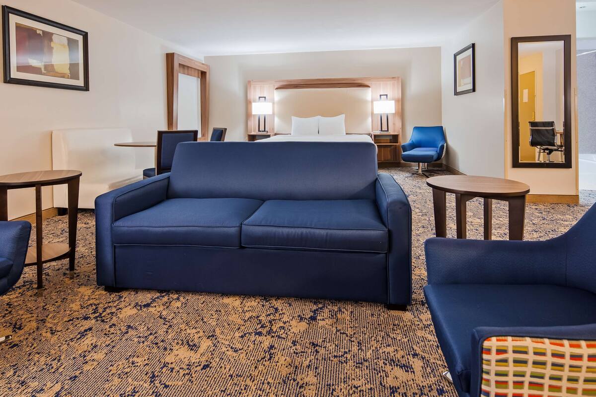 suite, 1 king bed, non smoking (with sofabed) | premium bedding, pillow-top beds, desk, blackout curtains