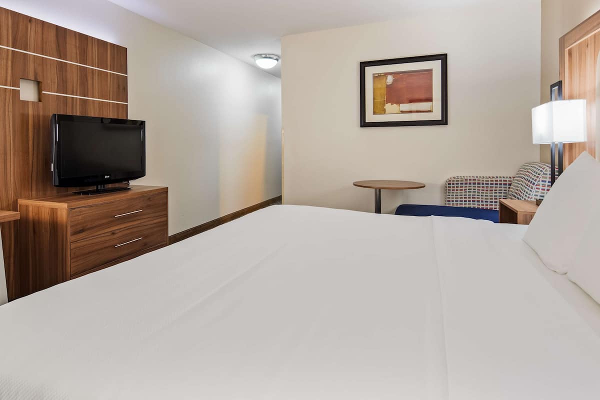 Premium bedding, pillow-top beds, desk, blackout curtains