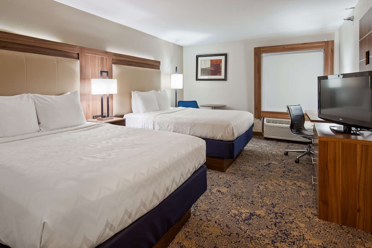 premium bedding, pillow-top beds, desk, blackout curtains