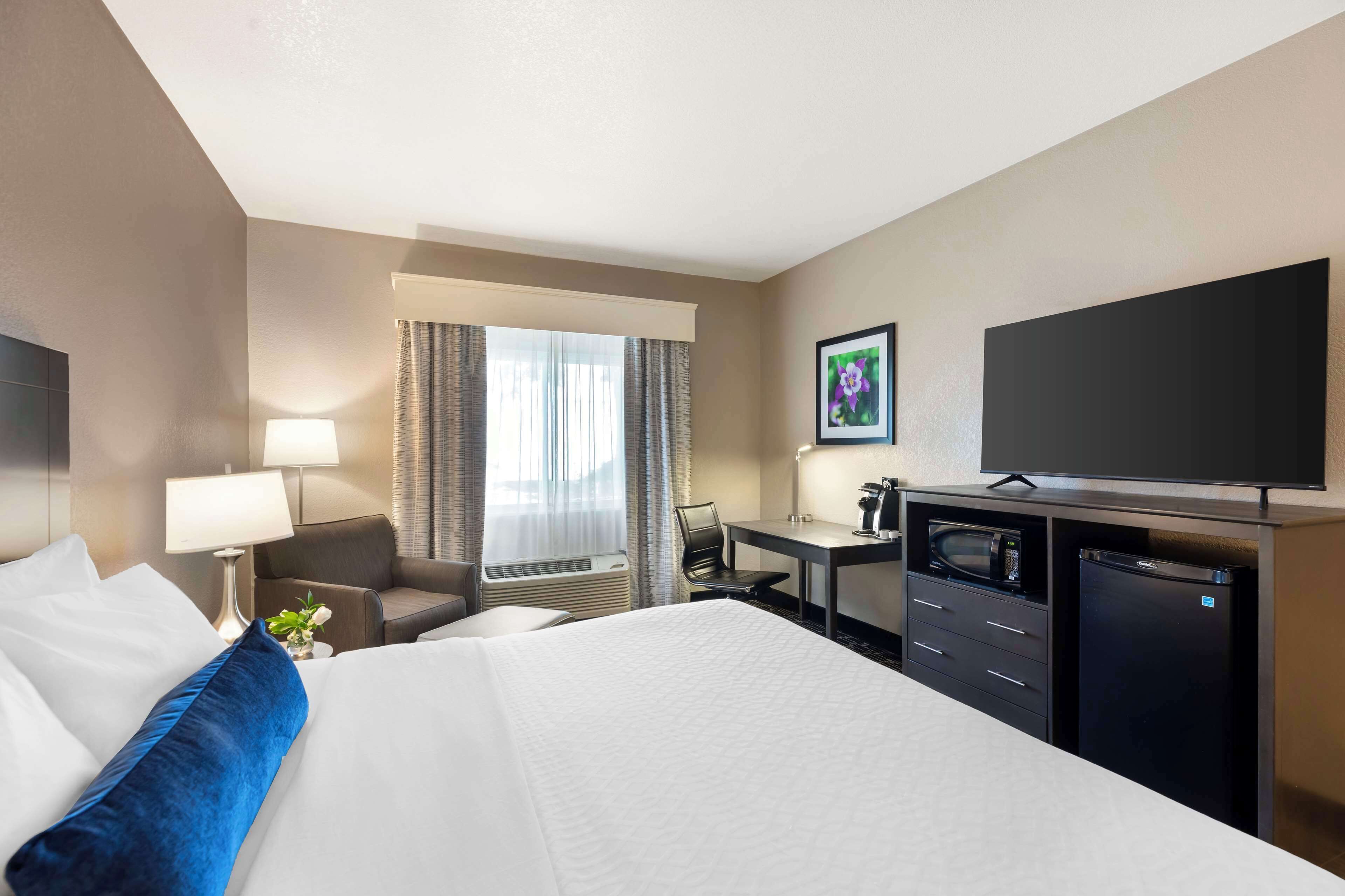 premium bedding, pillow-top beds, desk, laptop workspace