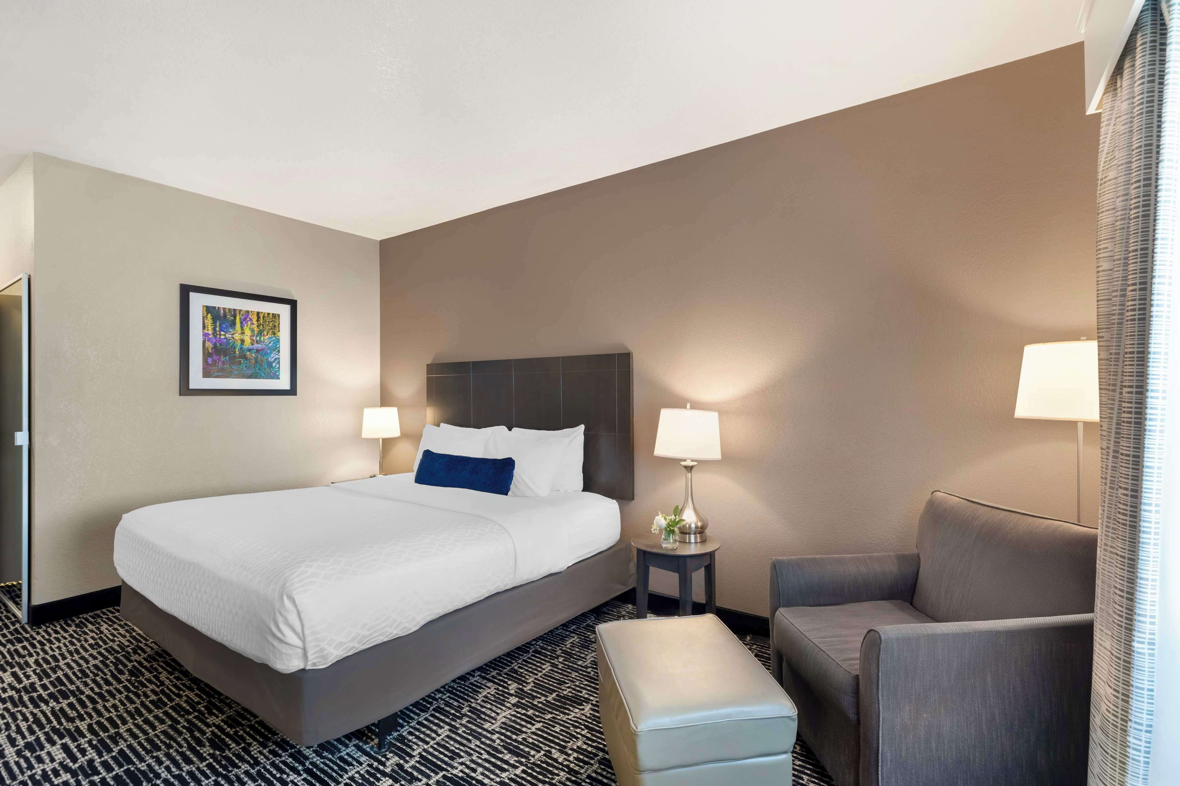 premium bedding, pillow-top beds, desk, laptop workspace