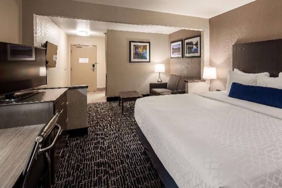 Premium bedding, pillow-top beds, desk, laptop workspace