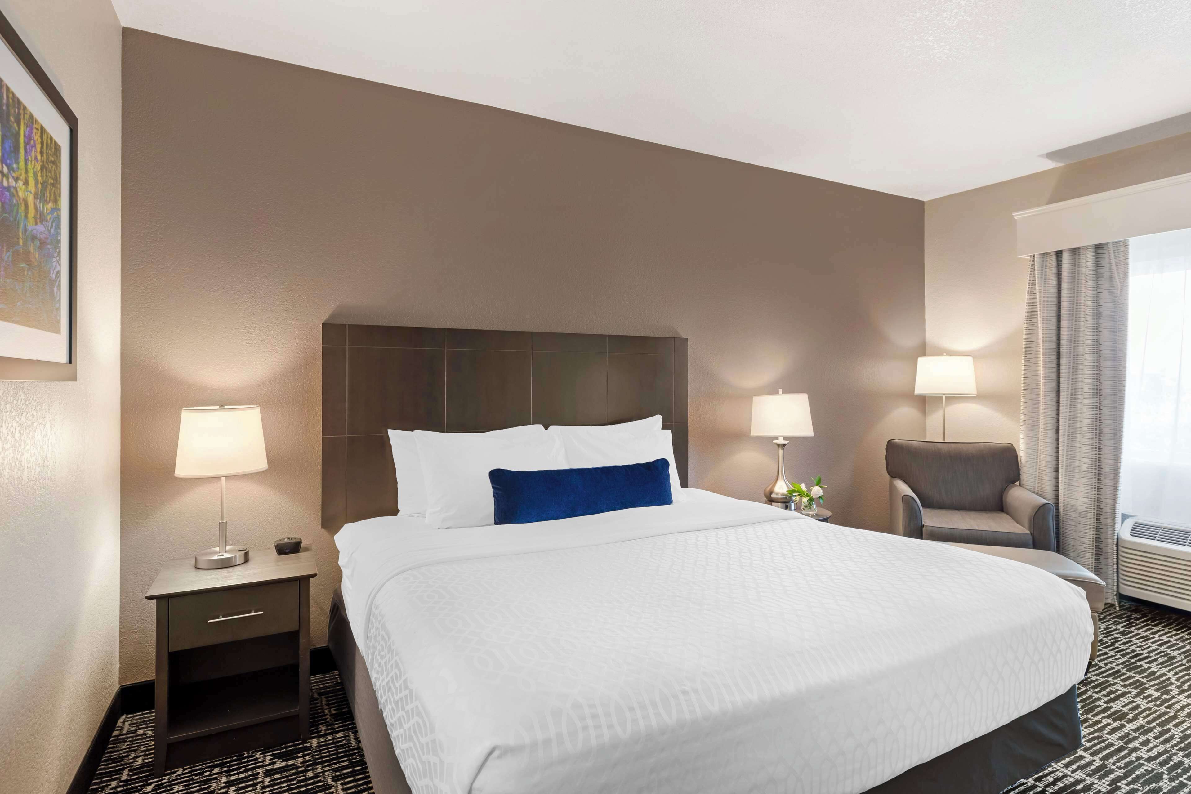 premium bedding, pillow-top beds, desk, laptop workspace