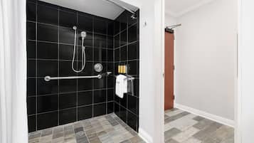Deluxe Room, 1 King Bed, Mobility Accessible | Bathroom | Designer toiletries, hair dryer, bathrobes, towels