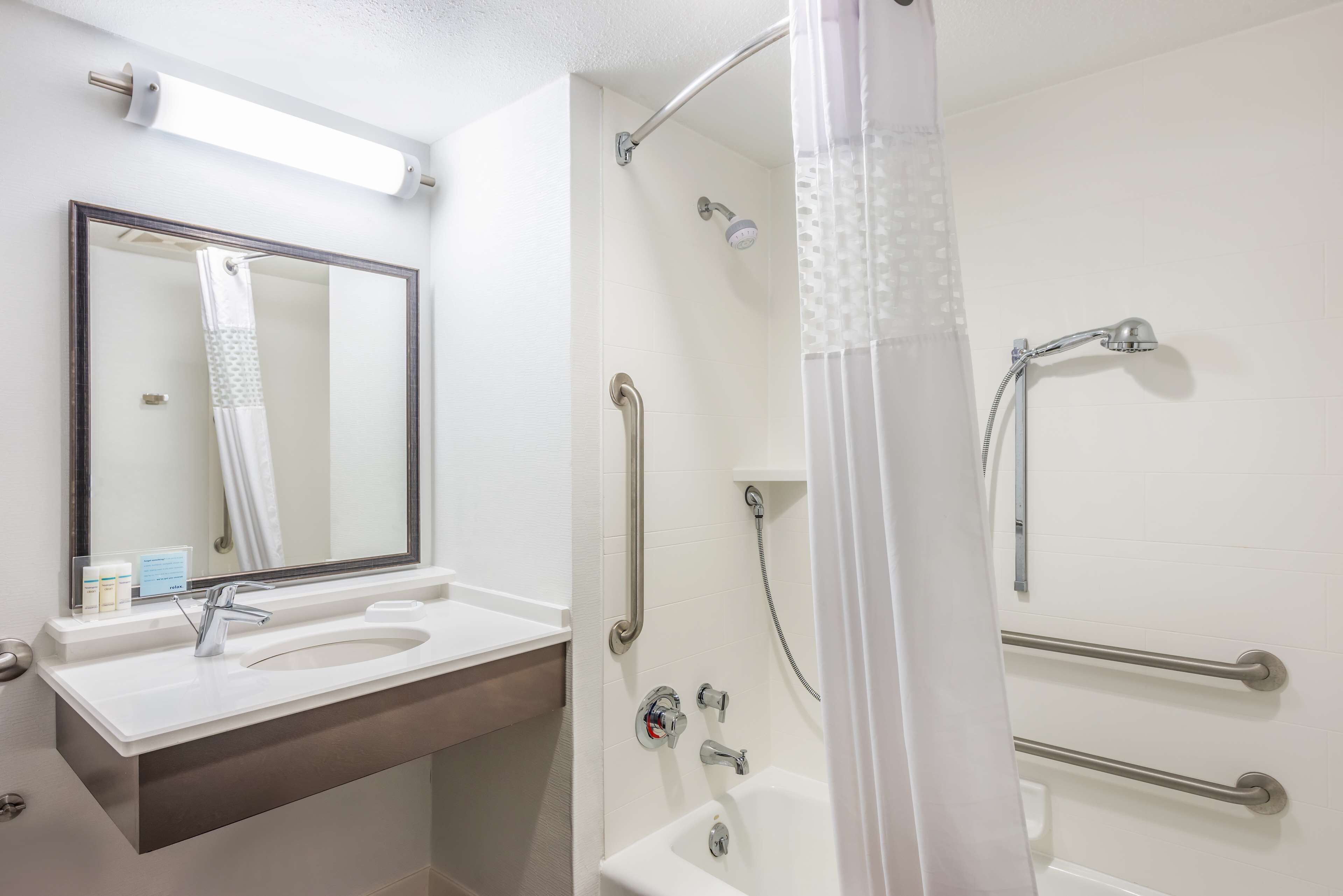 two queen size accessible room | bathroom | free toiletries, hair dryer, towels, soap