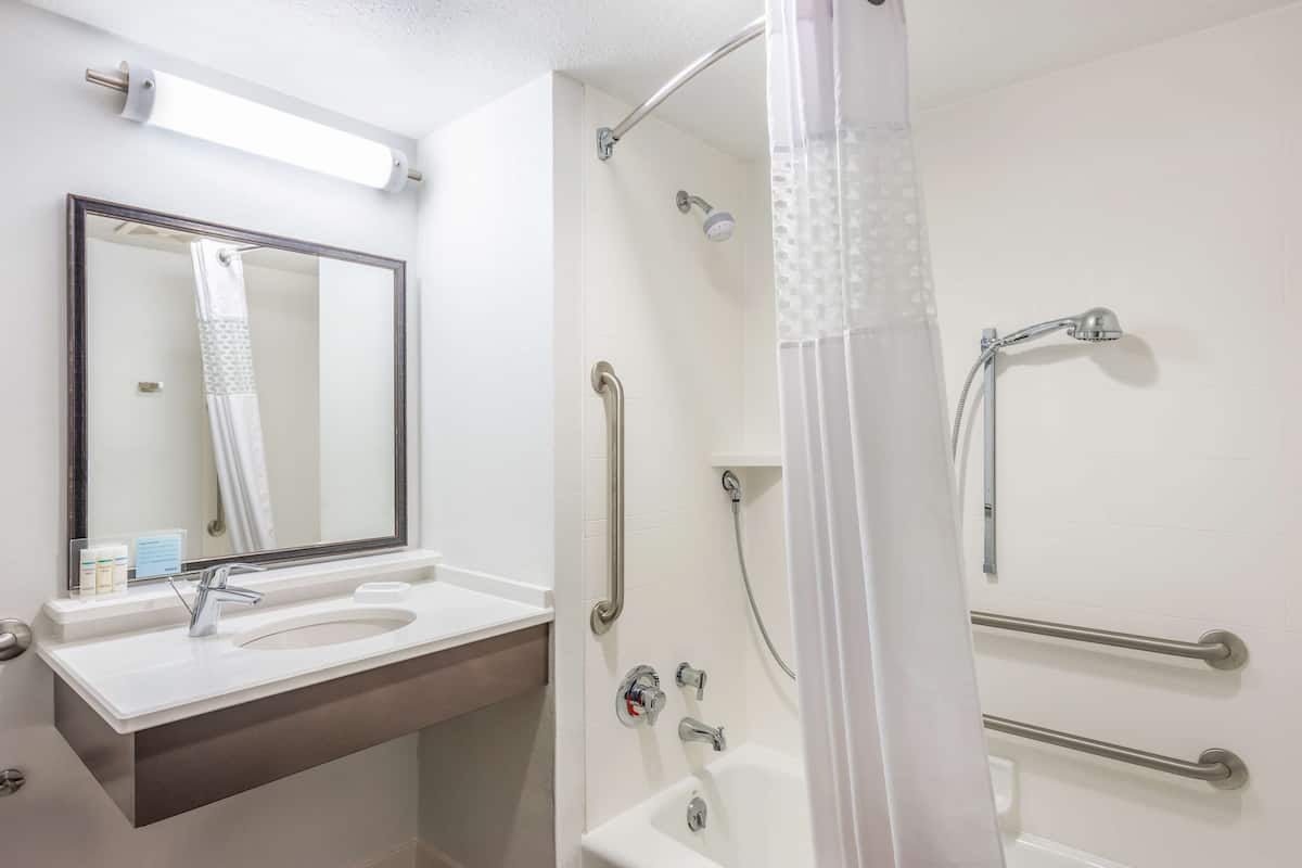 two queen size accessible room | bathroom | free toiletries, hair dryer, towels, soap