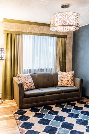 Efficiency Suite, 2 Bedrooms | Living area | 50-inch TV with satellite channels, foosball