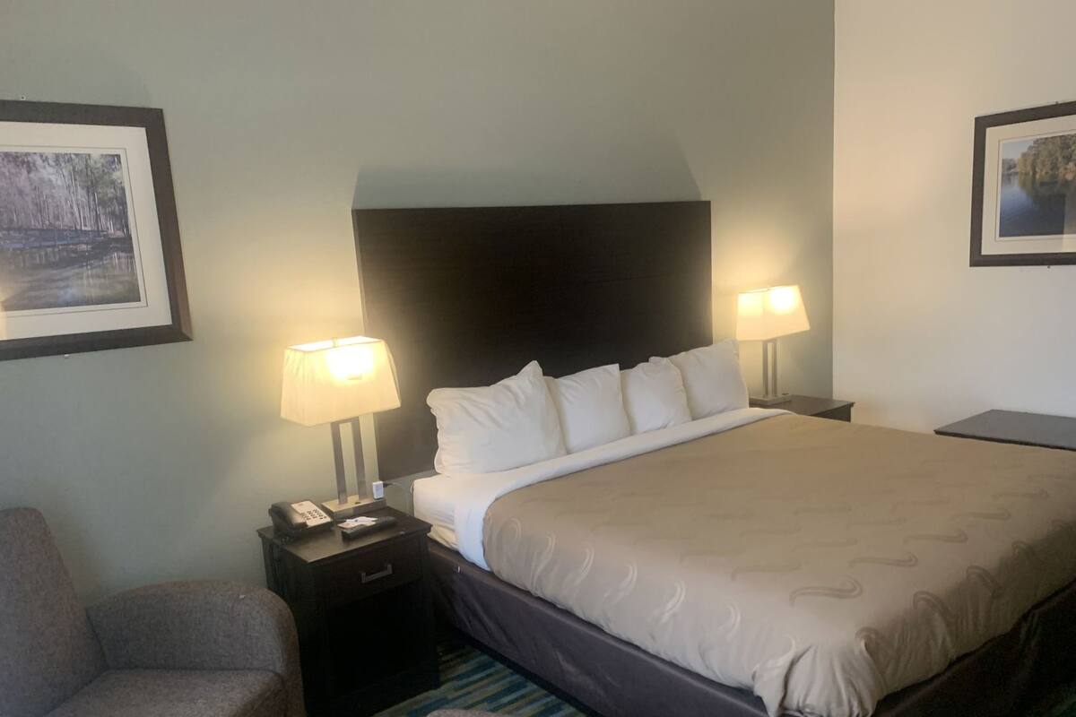 Premium bedding, desk, blackout drapes, iron/ironing board