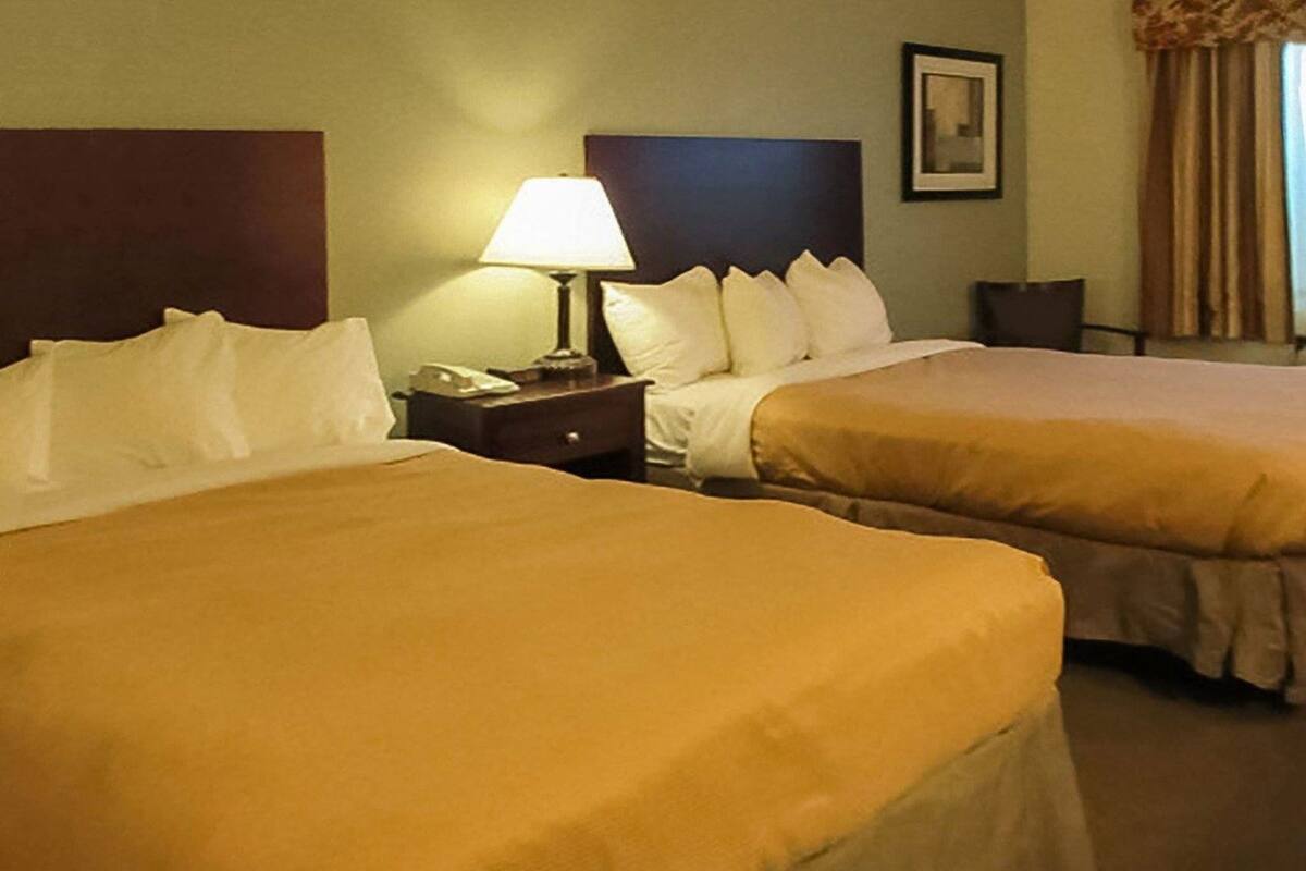 Premium bedding, desk, blackout drapes, iron/ironing board